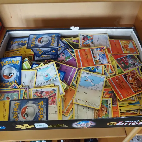 box; various Pokemon cards