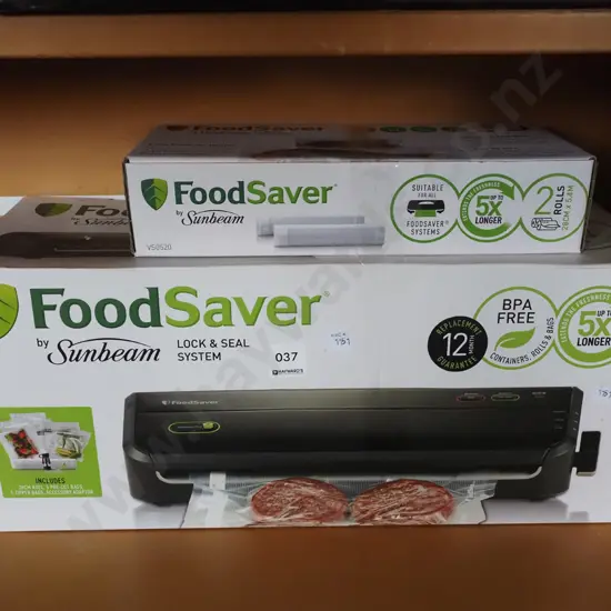Sunbeam boxed Food Saver and additional rolls