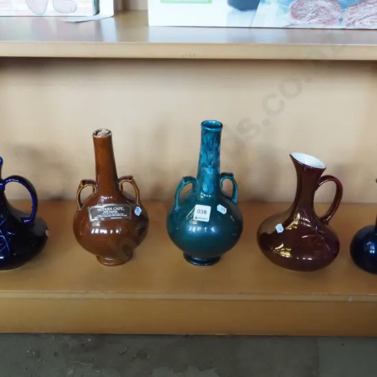 liqueur bottles, jugs, blue glass vase
