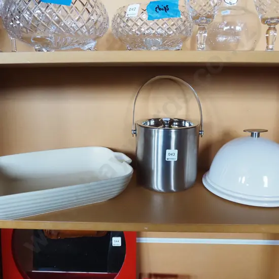 white baking dish, ice bucket, ceramic plate and cover