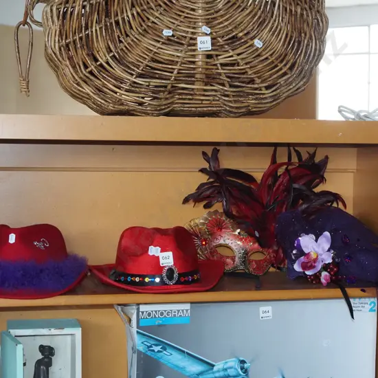 fancy hats and a carnival mask