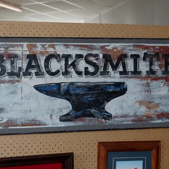 framed hand-painted wooden blacksmith vice sign