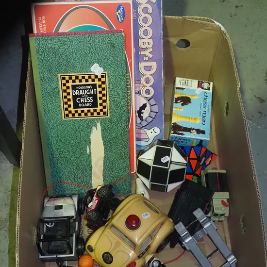 box; board games, chess pieces, toys etc