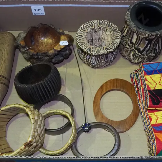 box; carved ponga vases, wooden bangles, small club etc