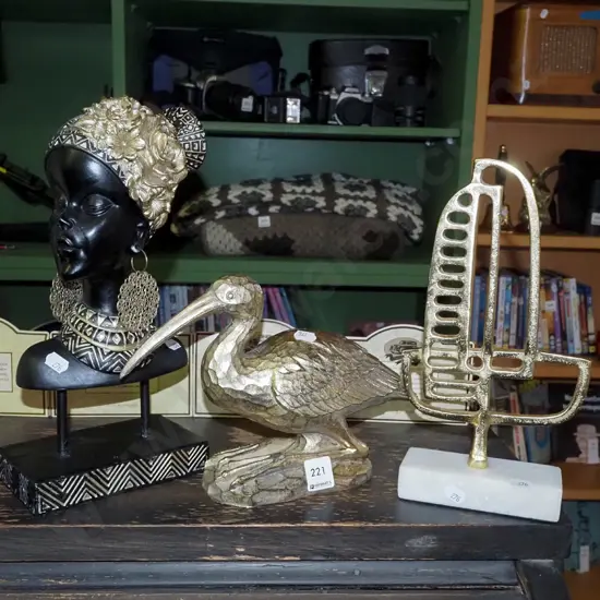 female bust on stand, pelican figurine, cast metal abstract sculpture Tallest H-330