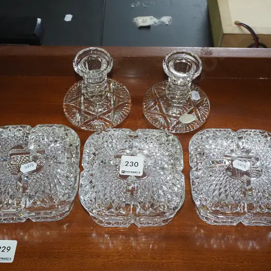 3x lidded cut glass storage canisters, 2xcrystal  candlesticks