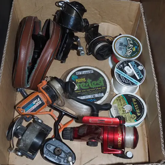 box; fishing line and reels