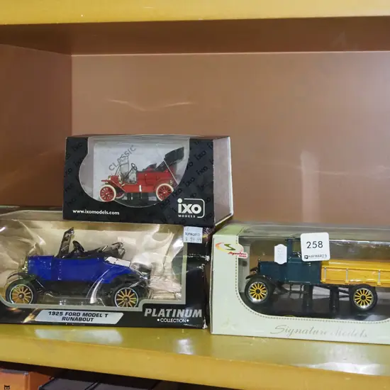 3x boxed model vehicles