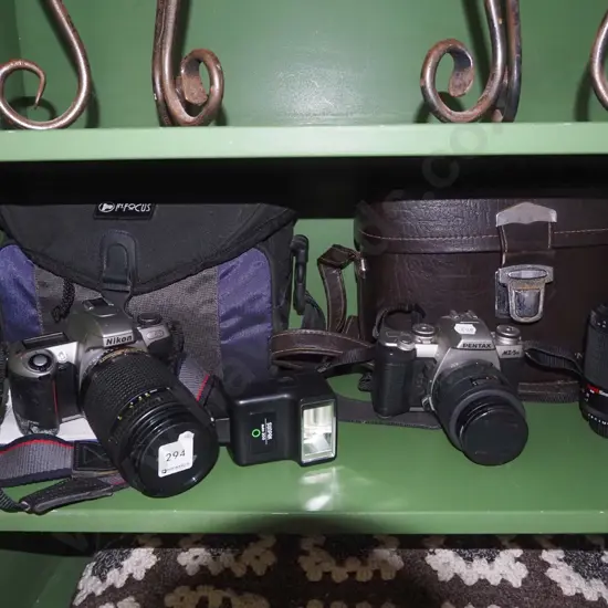 2x 35mm SLR cameras, camera bags, Pentax NZ/5N with additional lens, Nikon N65