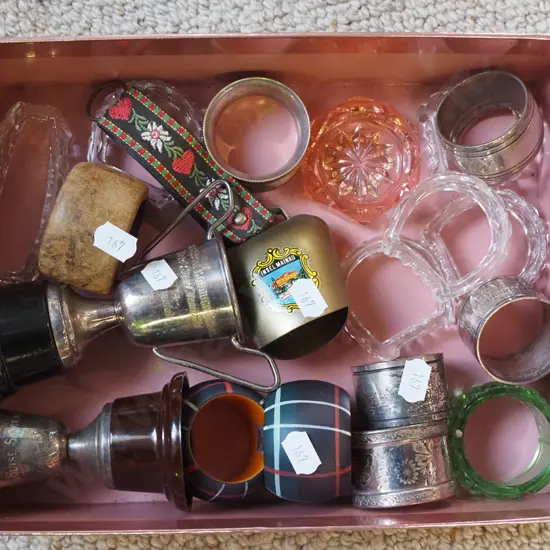 box; napkin rings, small trophies, cow bell etc