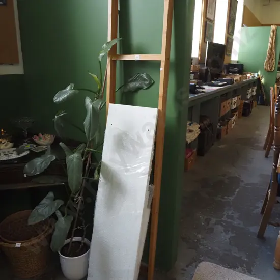 yet to be assembled melteca and bamboo shelving