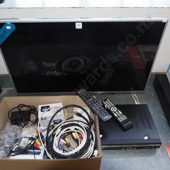 Panasonic TV with accessories and dish TV satellite box