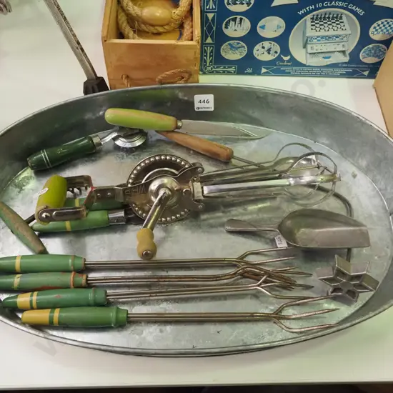 tin tray, egg beaters, cooking forks etc