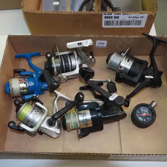 box; fishing reels and a tyre pressure gauge