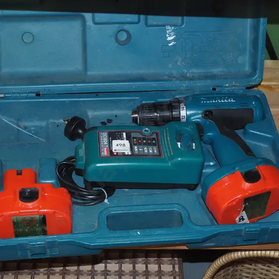 Makita 18V battery drill with cased charger and 2 batteries