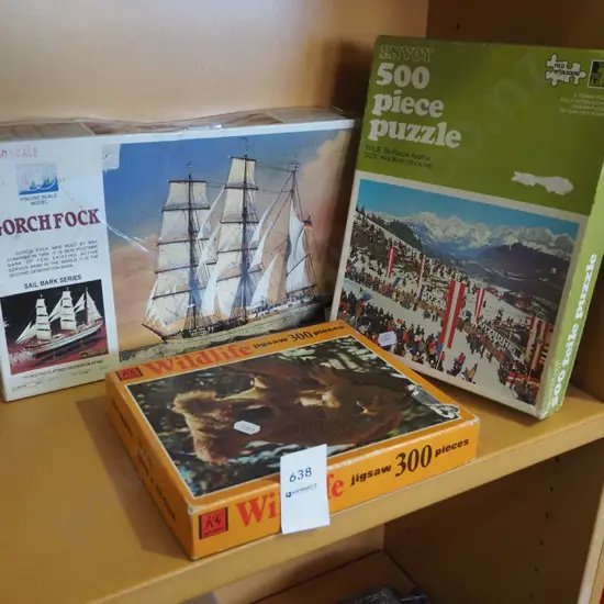 yet to be assembled sailing ship, 2x puzzles