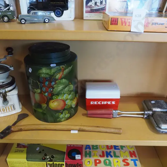 shelf; camp fire toaster pie maker, coffee mill, recipe container etc