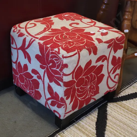 small upholstered ottoman/footstool