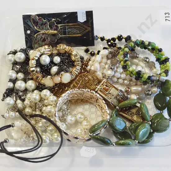 plastic tray of bangles and bracelets