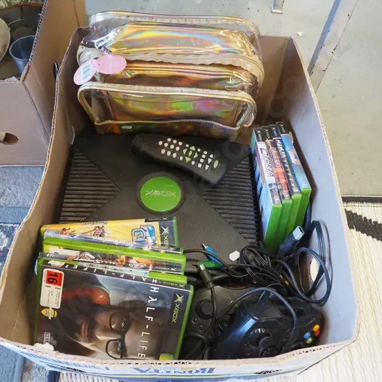 box; X-box console, games, controllers, toilet bags