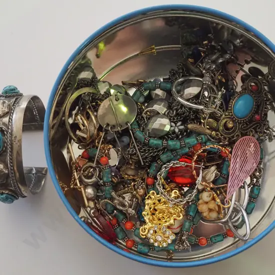 tin of costume jewellery