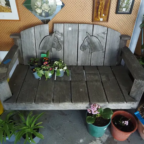 solid wood garden bench seat with carved horse head insets H-850 W-1300 D-700