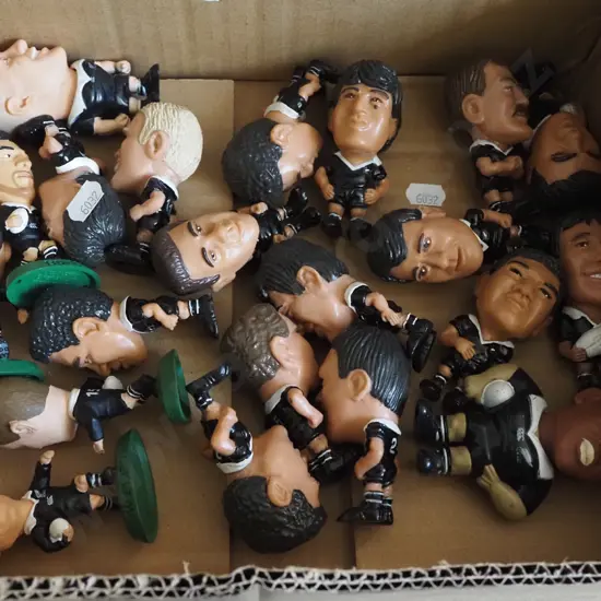 box; Caltex All Black figurines