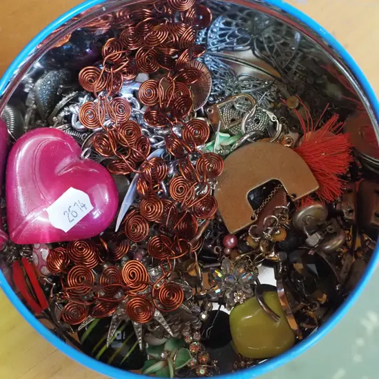 tin of costume jewellery