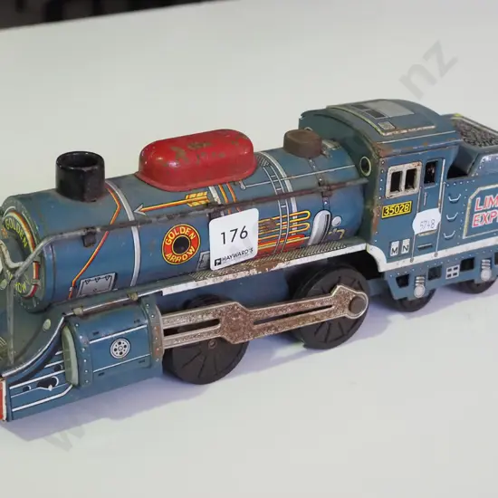 tin toy train - rusty