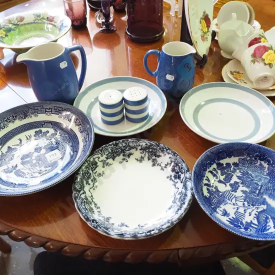 blue and white willow bowls, milk jugs, salt and pepper etc