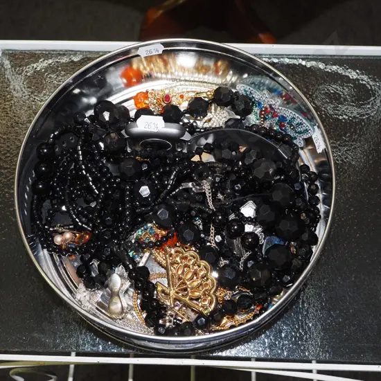 tin of costume jewellery