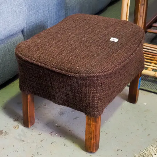 brown woollen upholstered footstool