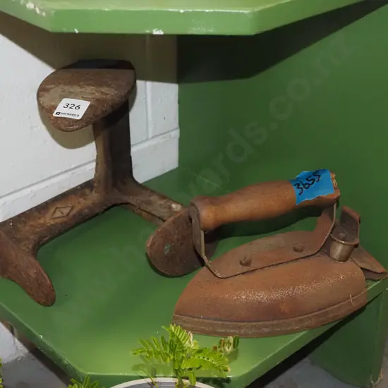 vintage electric iron and a shoe last