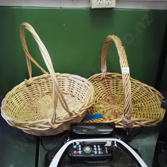 2 cane baskets