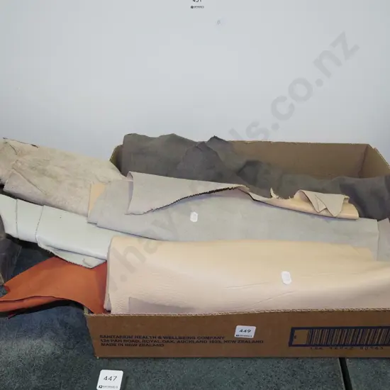 box of leather pieces