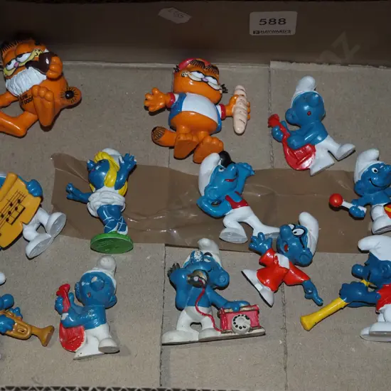 box of Smurfs and Garfield