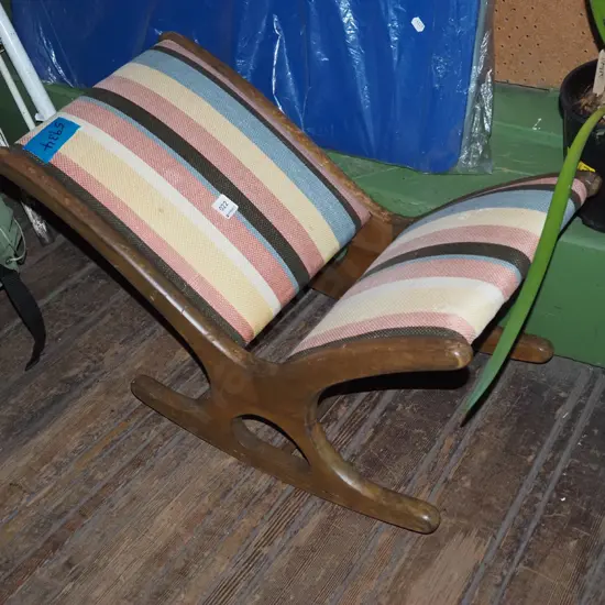 upholstered rocking footstool