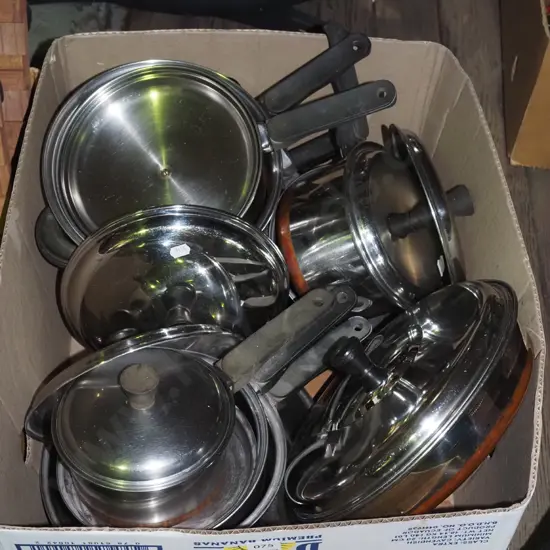 box of pots and pans