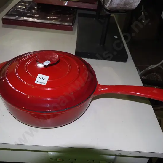 cast iron and enamel frying pan with lid