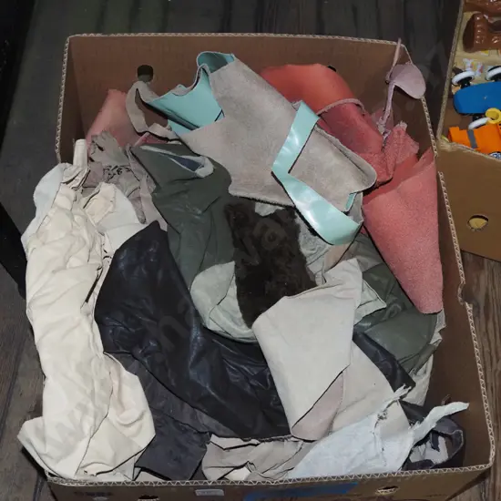 box of leather scraps