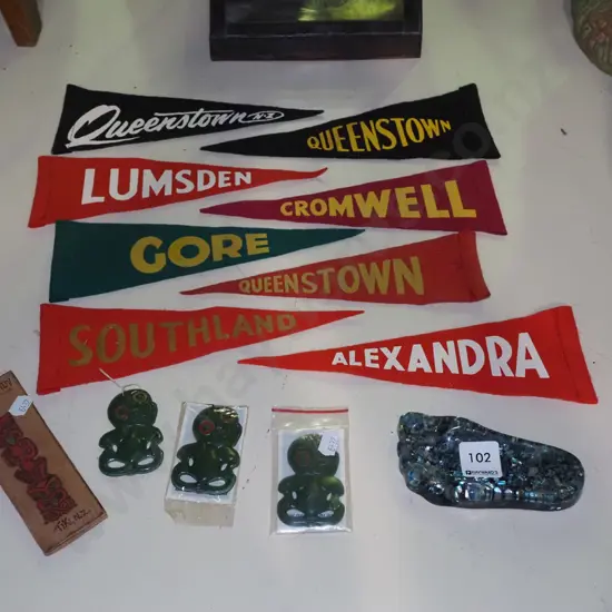 NZ souvenir tikis, ashtray, pennants 
