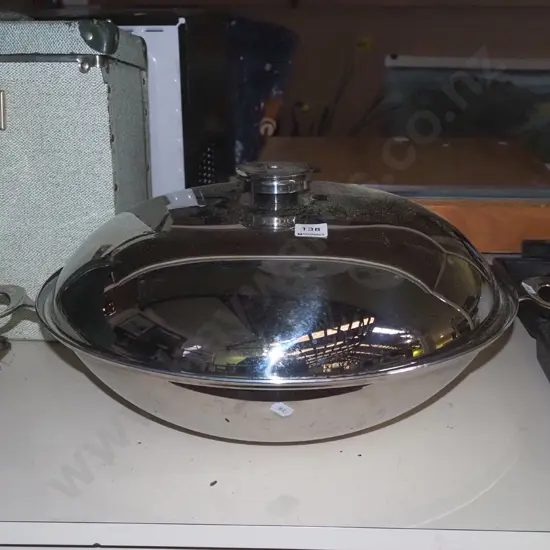 large stainless steel lidded wok