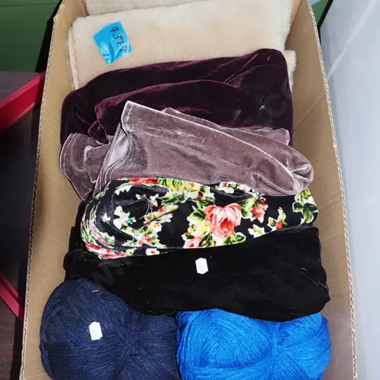 box; knitting yarn, fabric pieces