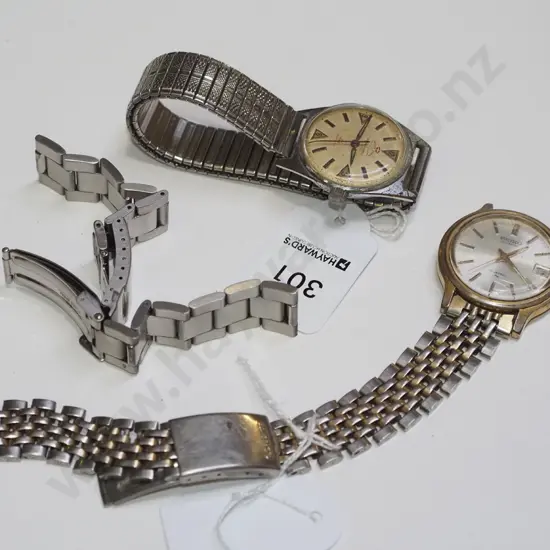 2x gent's wristwatches- 1 has broken strap and extra strap