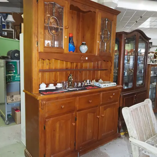 solid pine wall unit with 3 solid doors, 3 drawer, 2 bevelled edge and cut glass leadlight windows