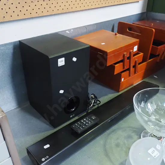 LG sound bar with remote and speaker