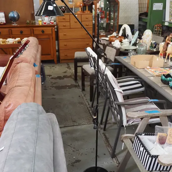 black metal adjustable standard lamp