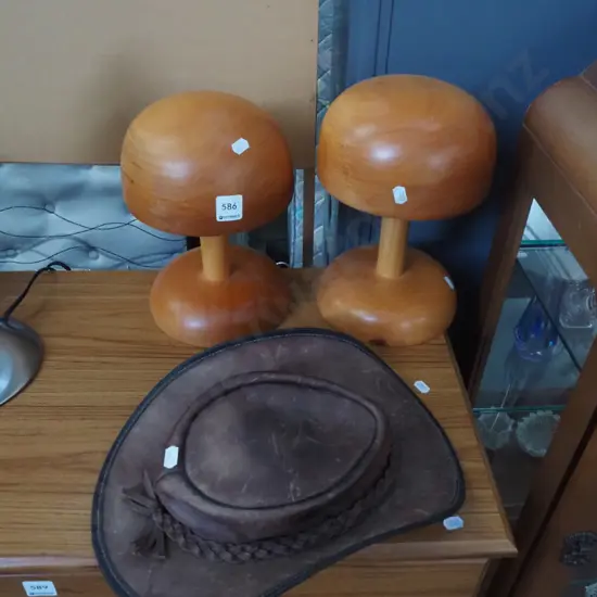 leather stockmens hat, 2x wooden hat stands
