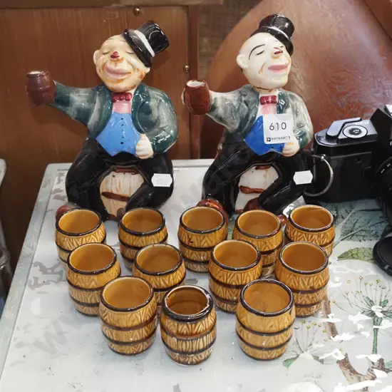 2x character decanters, 12x small barrel tumblers