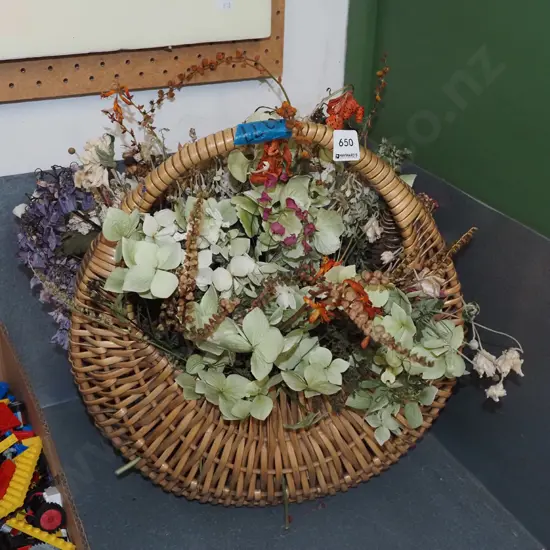 woven plastic moon basket and faux flowers